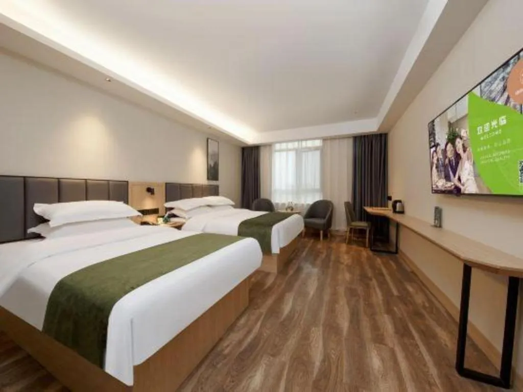 Bed in GreenTree Inn Jiangsu Changzhou Henglin Town Shuntong Road Express Hotel