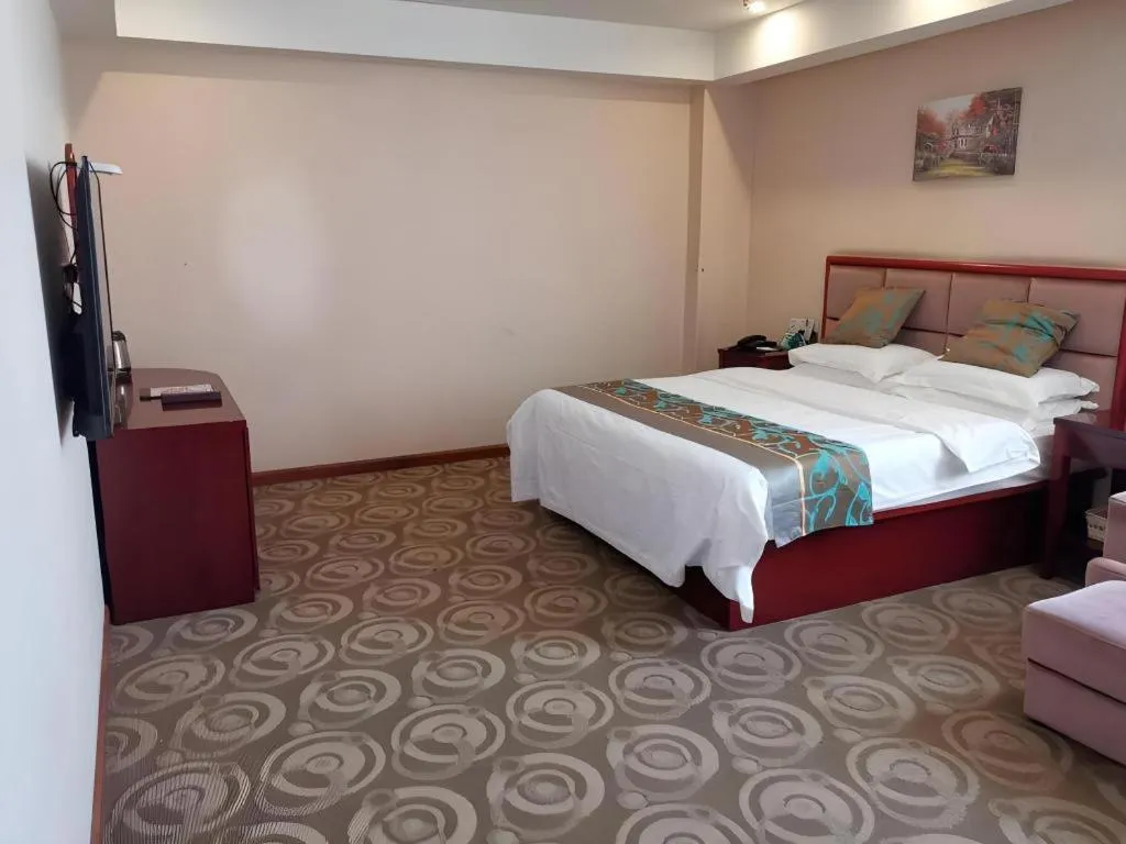 Bed in GreenTree Inn Jiangsu Changzhou Henglin Town Shuntong Road Express Hotel