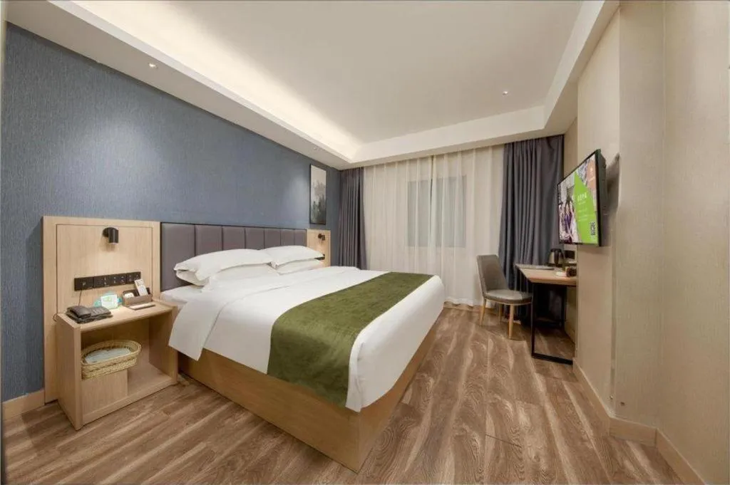 Bed in GreenTree Inn Jiangsu Changzhou Henglin Town Shuntong Road Express Hotel