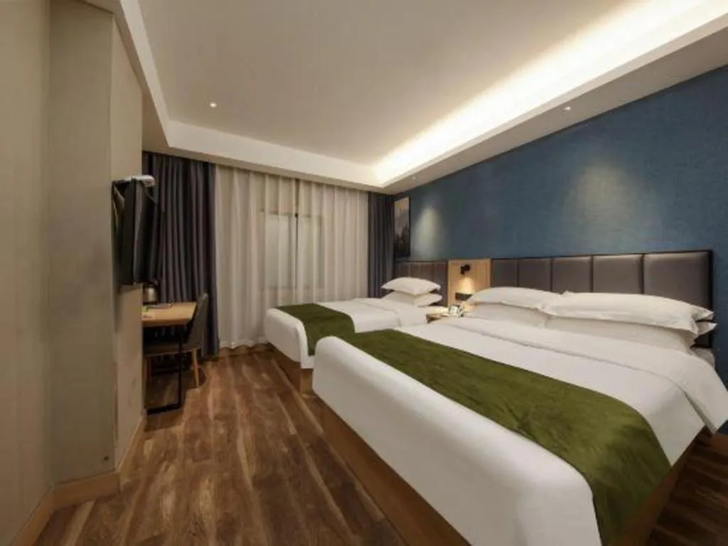 Bed in GreenTree Inn Jiangsu Changzhou Henglin Town Shuntong Road Express Hotel