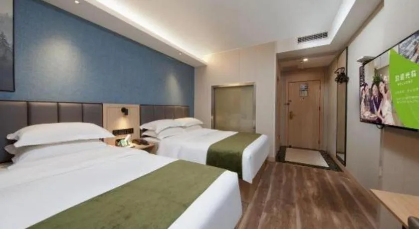 Bed in GreenTree Inn Jiangsu Changzhou Henglin Town Shuntong Road Express Hotel