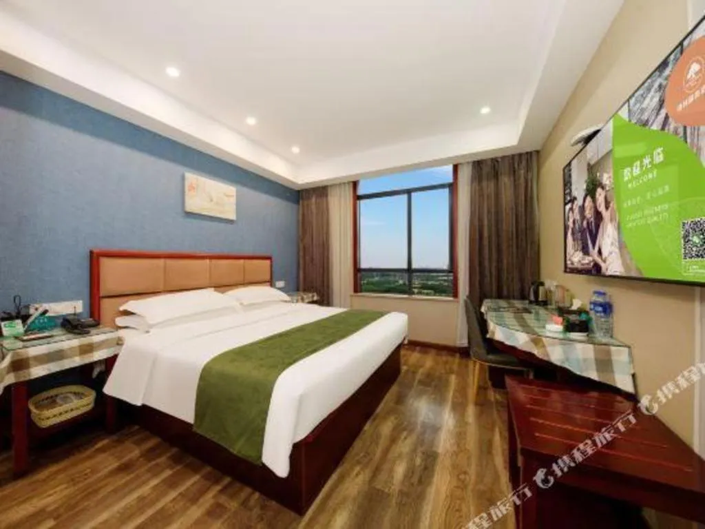Bed in GreenTree Inn Jiangsu Changzhou Henglin Town Shuntong Road Express Hotel