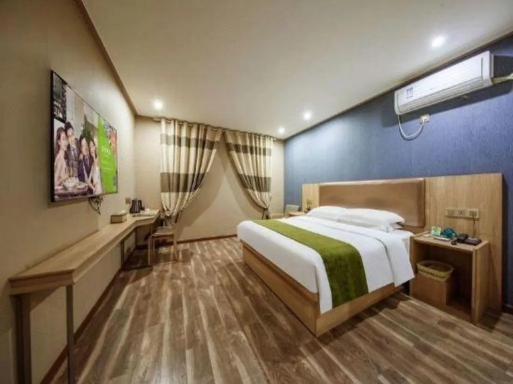 Bed in GreenTree Inn Jiangsu Changzhou Henglin Town Shuntong Road Express Hotel