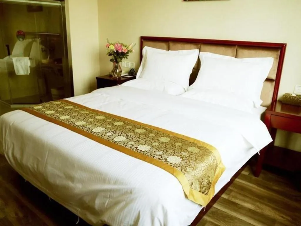 Bed in GreenTree Inn Jiangsu Changzhou Henglin Town Shuntong Road Express Hotel