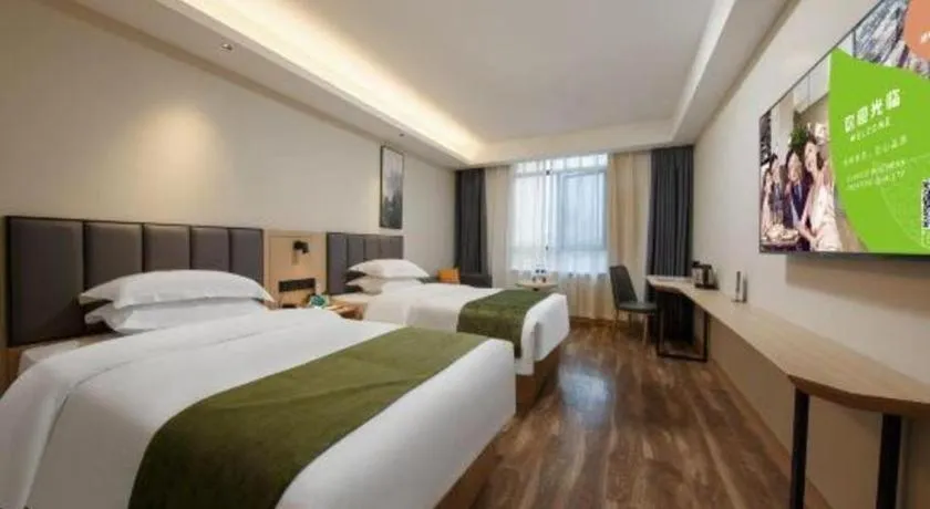 Bed in GreenTree Inn Jiangsu Changzhou Henglin Town Shuntong Road Express Hotel