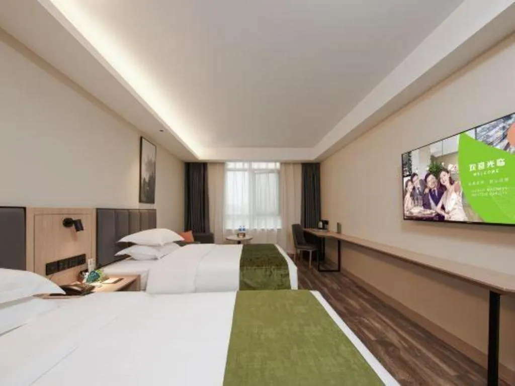 Bed in GreenTree Inn Jiangsu Changzhou Henglin Town Shuntong Road Express Hotel