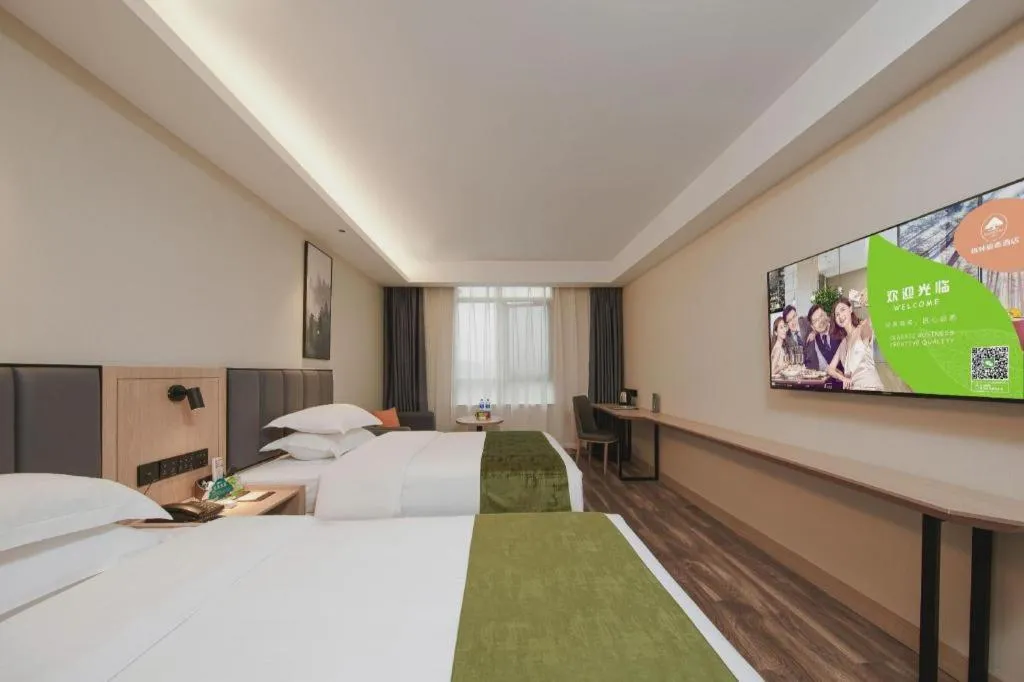 Bed in GreenTree Inn Jiangsu Changzhou Henglin Town Shuntong Road Express Hotel