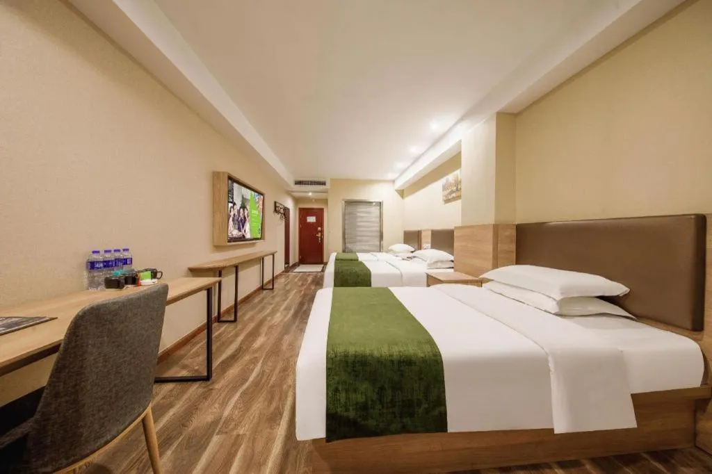 Bed in GreenTree Inn Jiangsu Changzhou Henglin Town Shuntong Road Express Hotel