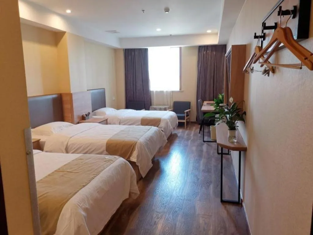 Bed in GreenTree Inn Jiangsu Changzhou Henglin Town Shuntong Road Express Hotel