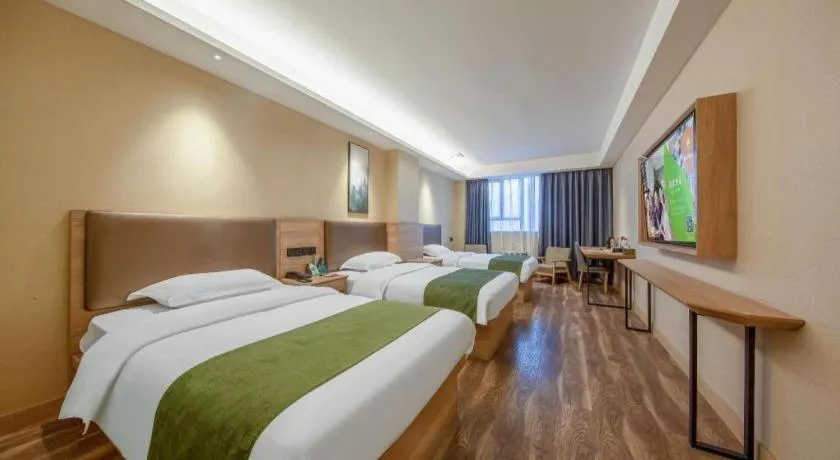 Bed in GreenTree Inn Jiangsu Changzhou Henglin Town Shuntong Road Express Hotel