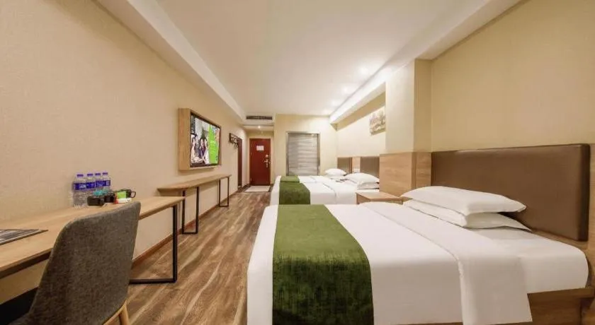 Bed in GreenTree Inn Jiangsu Changzhou Henglin Town Shuntong Road Express Hotel