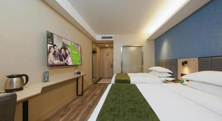 Bed in GreenTree Inn Jiangsu Changzhou Henglin Town Shuntong Road Express Hotel