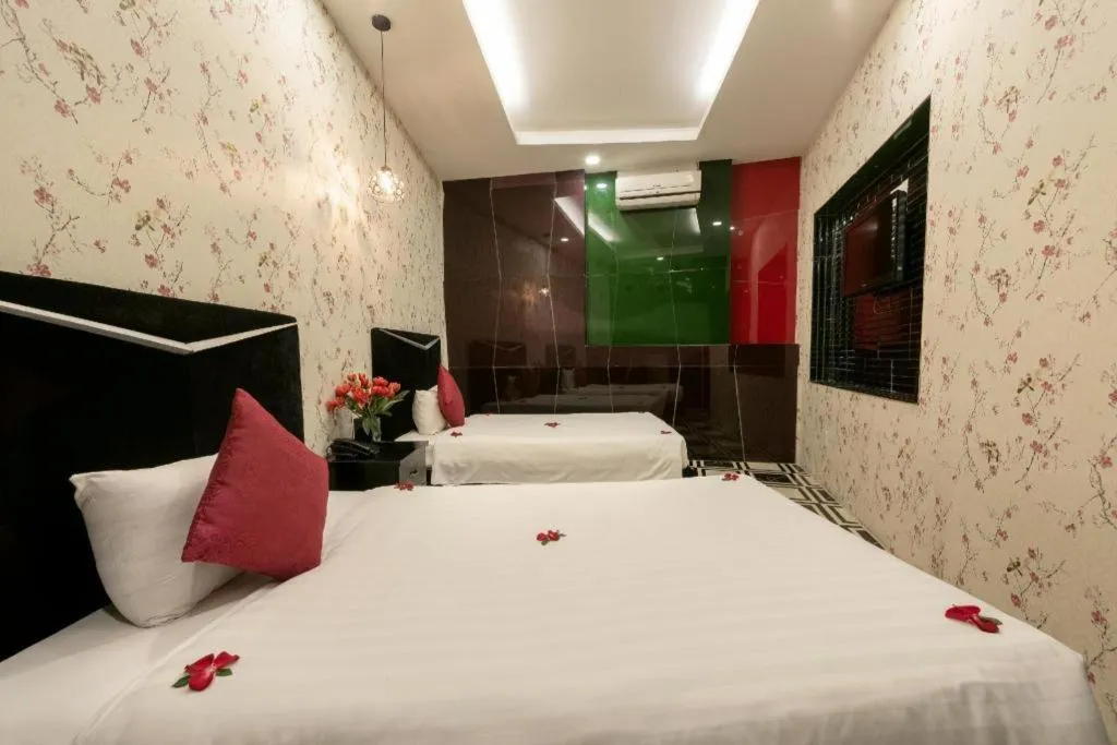 Bed in Helios Legend Hotel