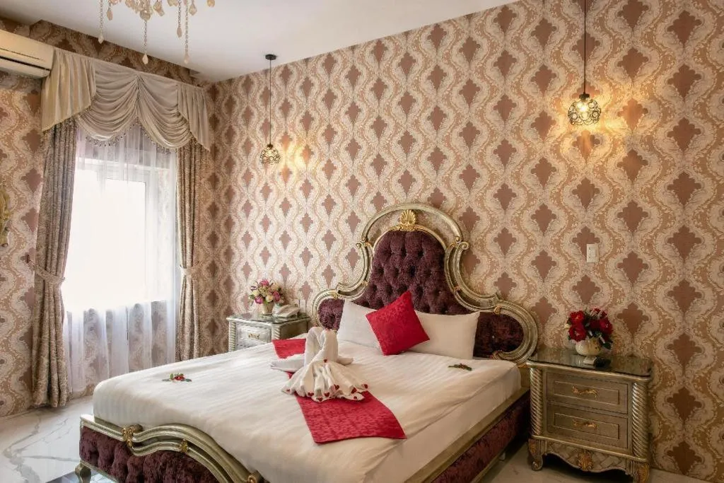 Bed in Helios Legend Hotel