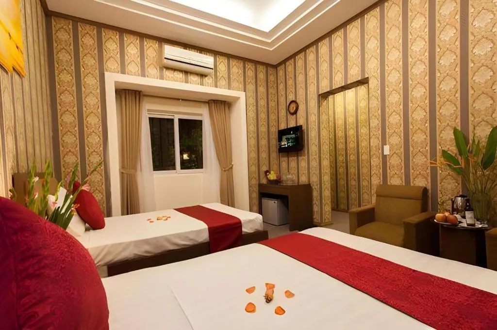 Bed in Helios Legend Hotel