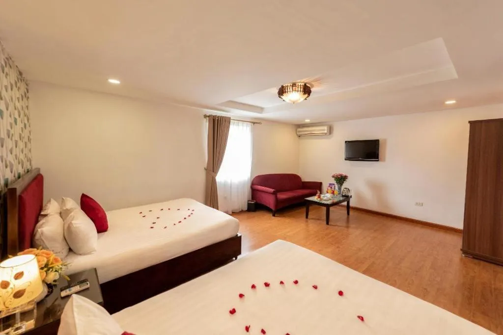 Bed in Helios Legend Hotel