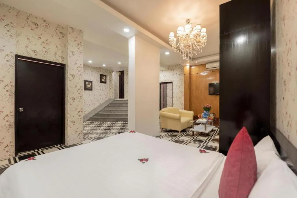 Bed in Helios Legend Hotel