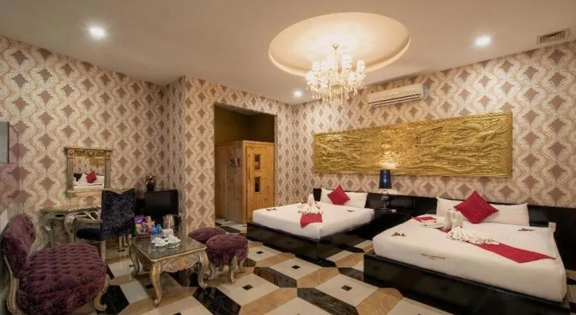 Bed in Helios Legend Hotel