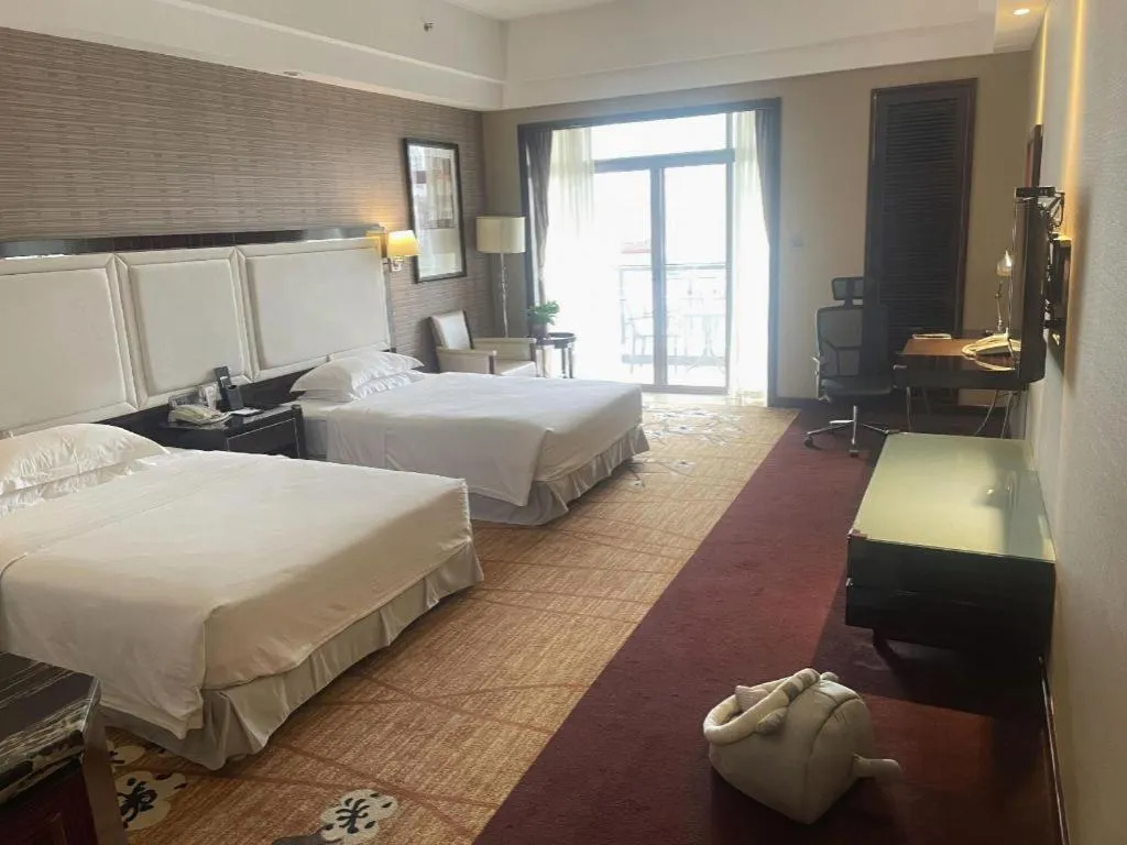 Bed in Country Garden Phoenix Hotel Yangshan