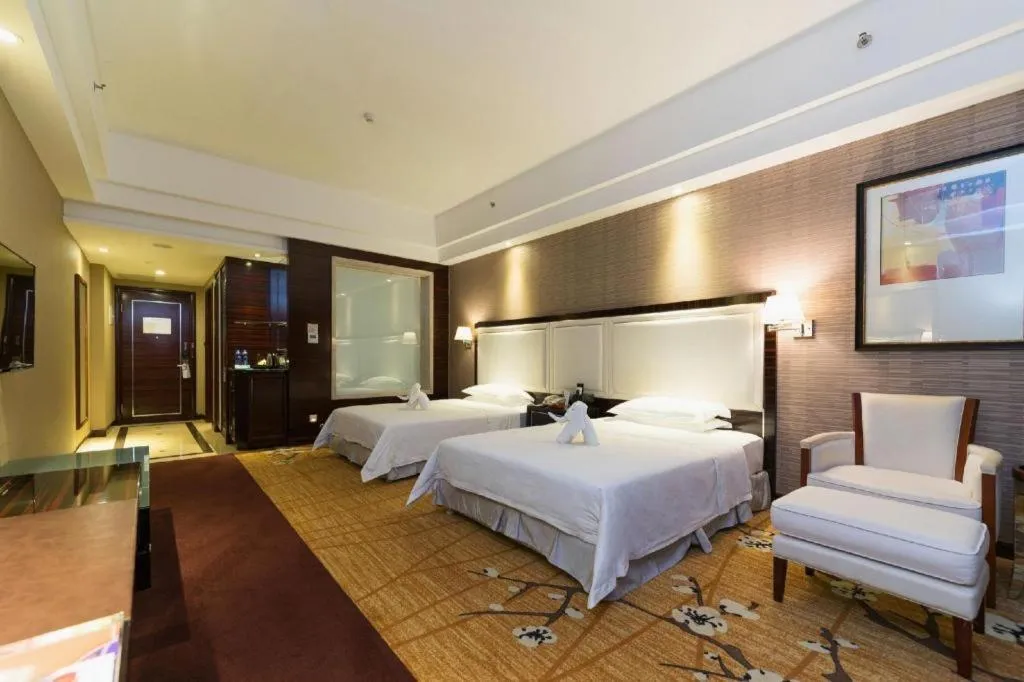 Bed in Country Garden Phoenix Hotel Yangshan