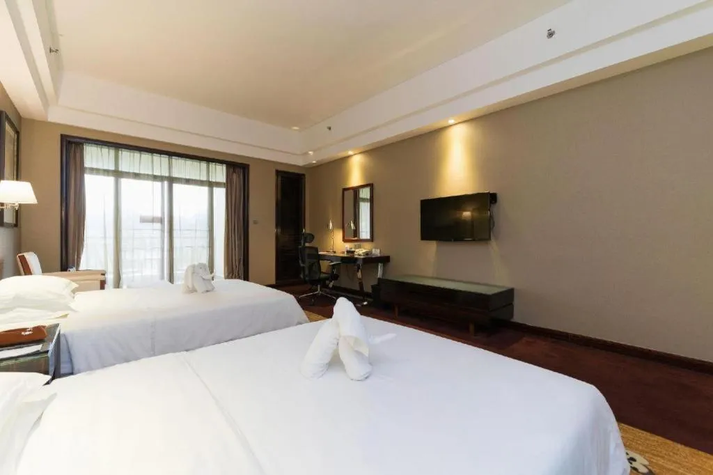 Bed in Country Garden Phoenix Hotel Yangshan