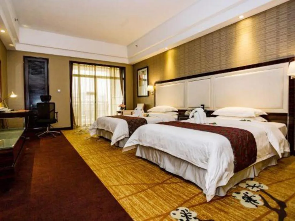 Bed in Country Garden Phoenix Hotel Yangshan