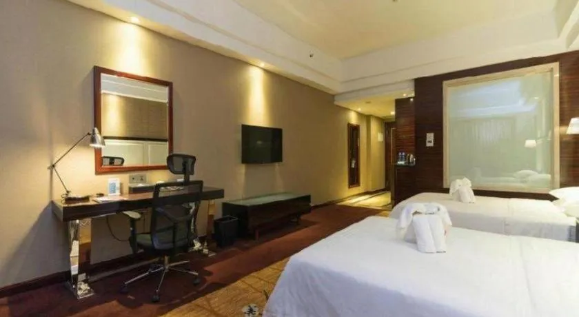 Bed in Country Garden Phoenix Hotel Yangshan