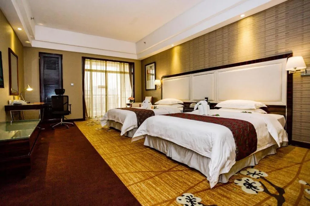 Bed in Country Garden Phoenix Hotel Yangshan