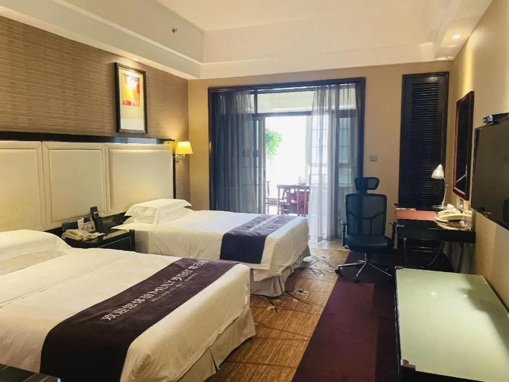 Bed in Country Garden Phoenix Hotel Yangshan