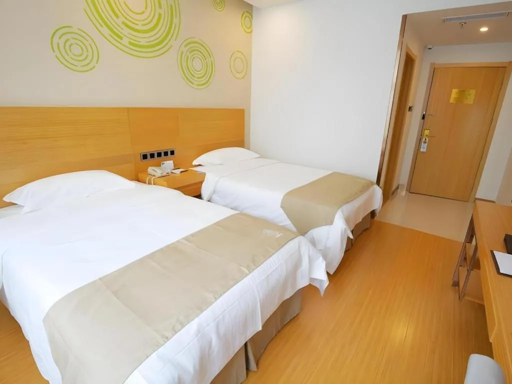 Bed in GreenTree Inn Suzhou Changshu North Haiyu Road Changhui Square Express Hotel