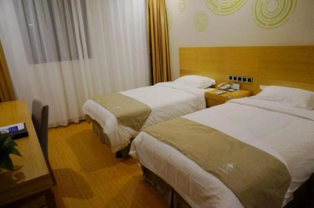 Bed in GreenTree Inn Suzhou Changshu North Haiyu Road Changhui Square Express Hotel