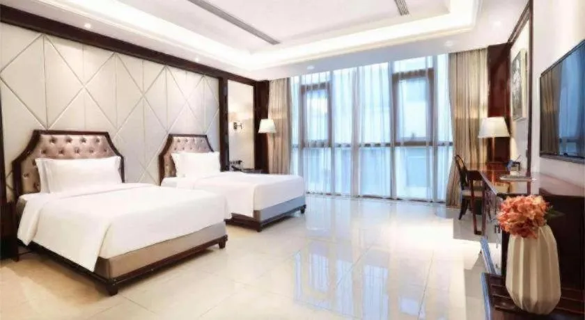 Bed in Jinsha Seaview Hotel Sanya