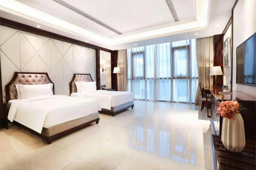 Bed in Jinsha Seaview Hotel Sanya