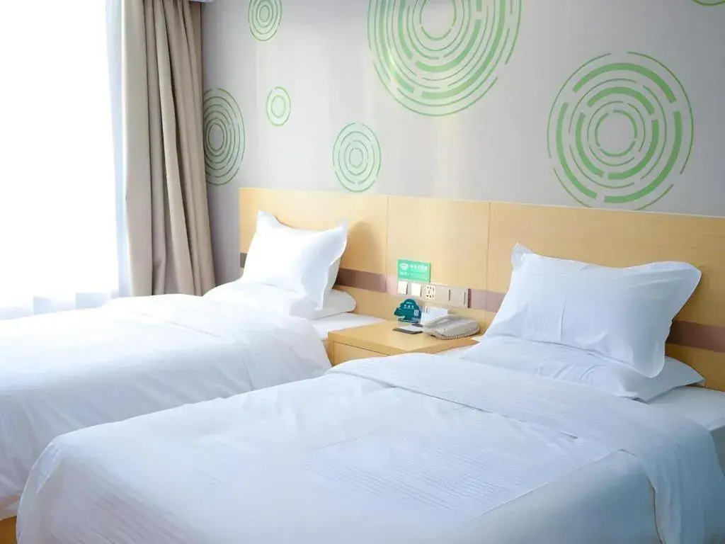 Bed in GreenTree Inn Qufu High Speed Railway Station Bed in GreenTree Inn Qufu High Speed Railway Station