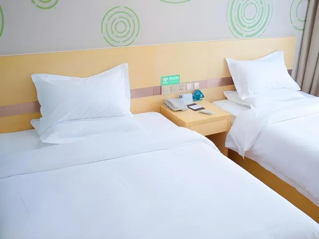 Bed in GreenTree Inn Qufu High Speed Railway Station Bed in GreenTree Inn Qufu High Speed Railway Station