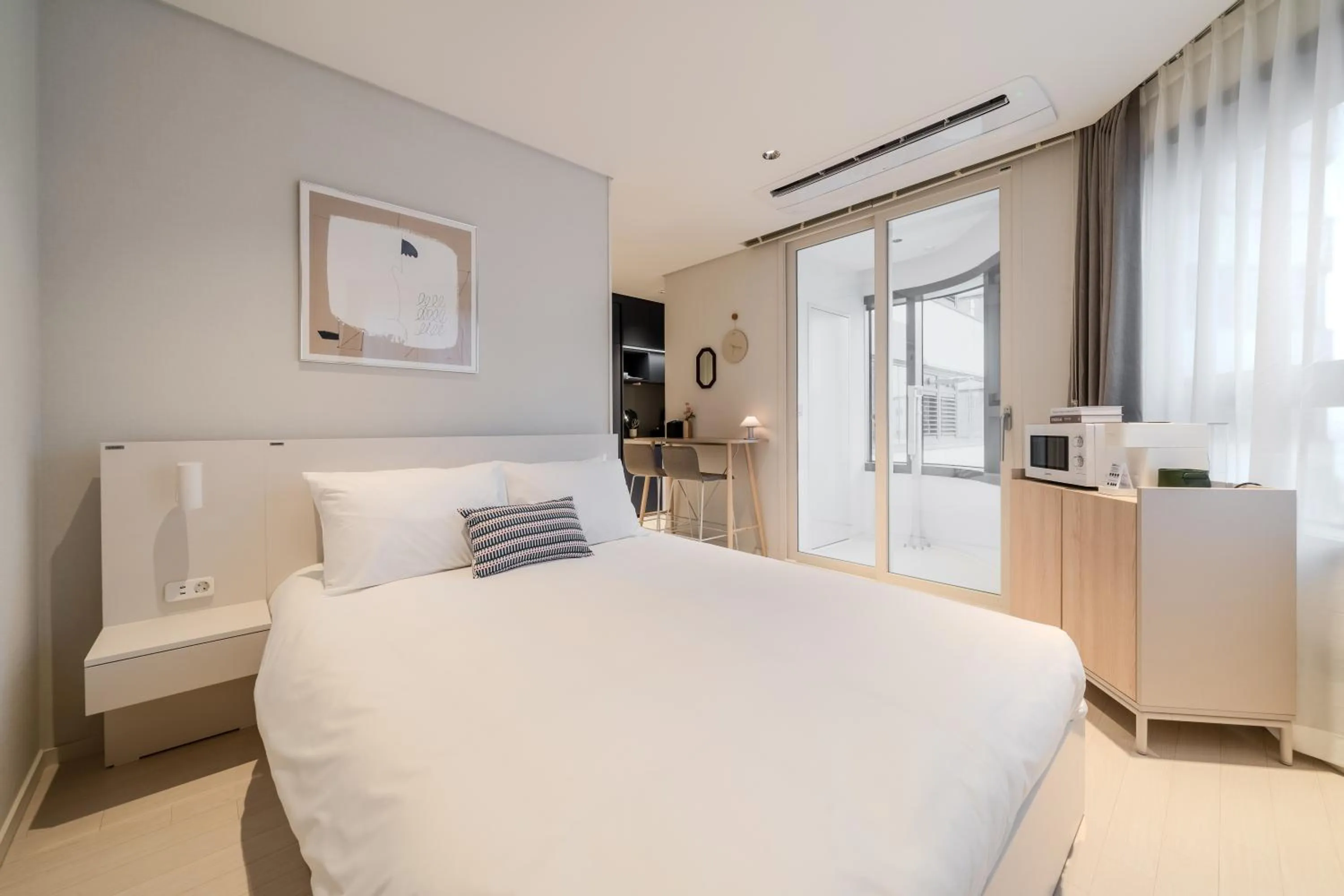 Bed in Le Collective Haeundae Paragraf