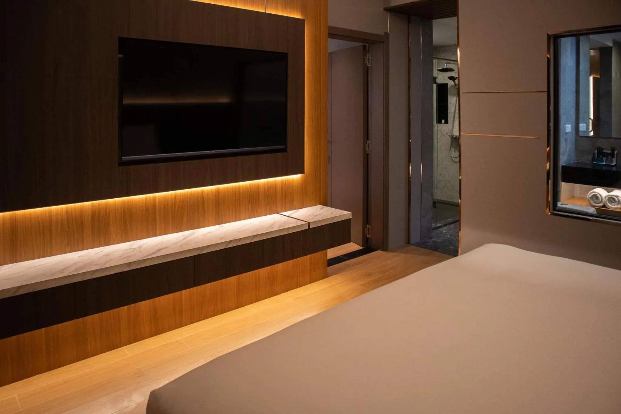 Bed in Aglow Hotel Harbor Bay Batam