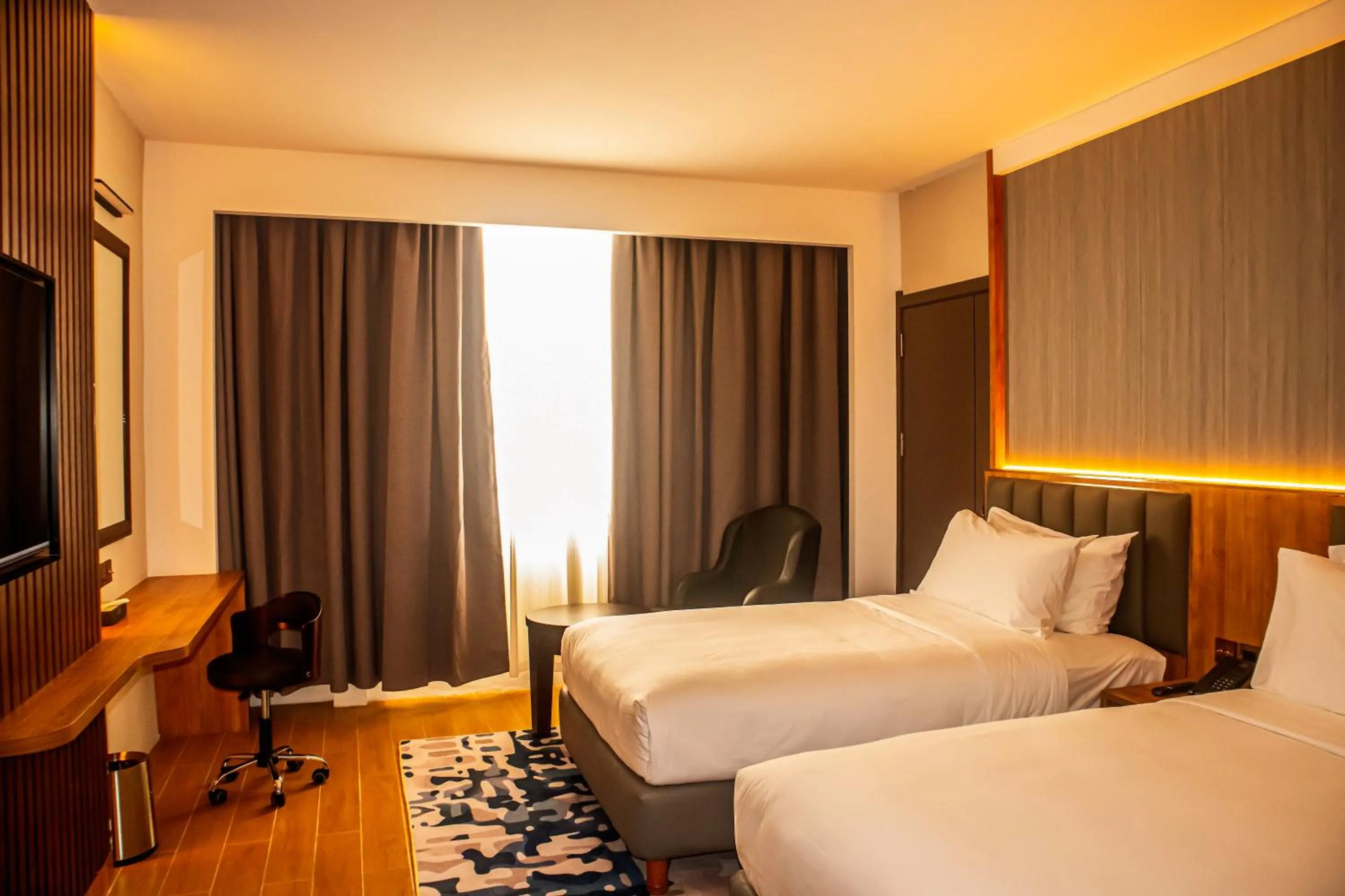 Bedroom, Bed in Aglow Hotel Harbor Bay Batam