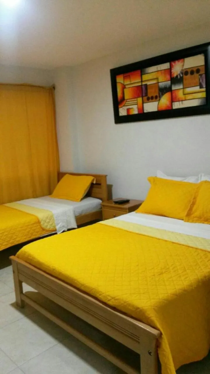 Photo of the whole room, Bed in Caribbean Island Hotel piso 1