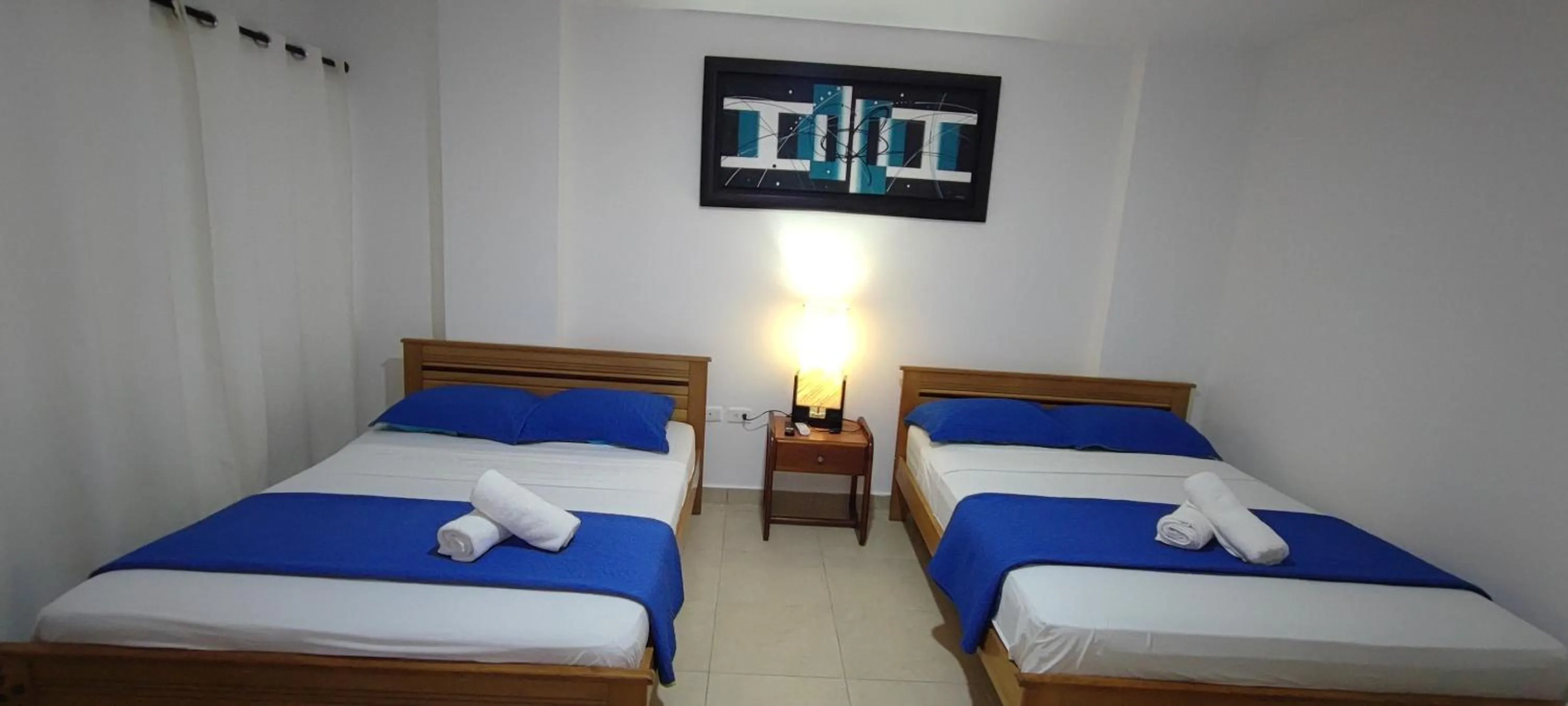 Bedroom, Bed in Caribbean Island Hotel piso 1