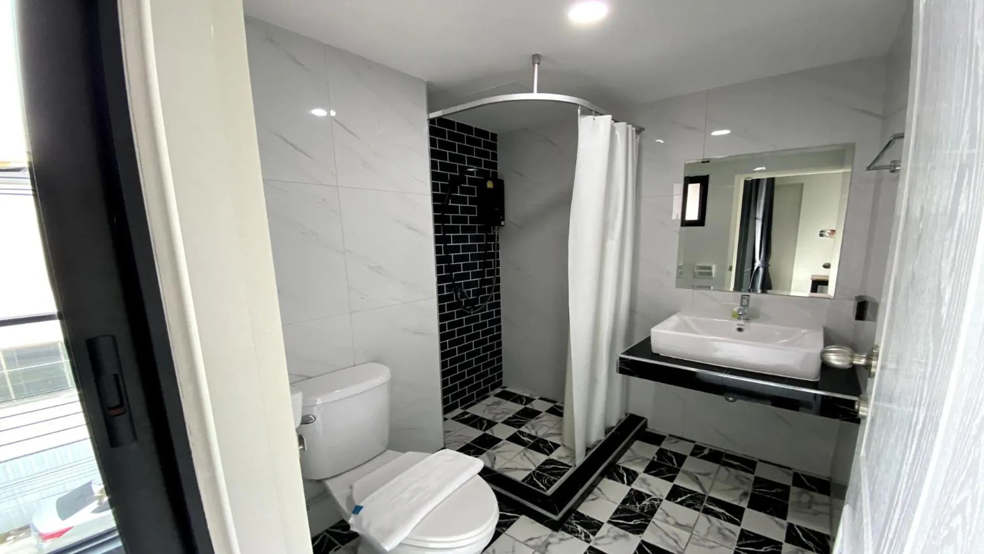 Bathroom in OK Hotel Bangkok