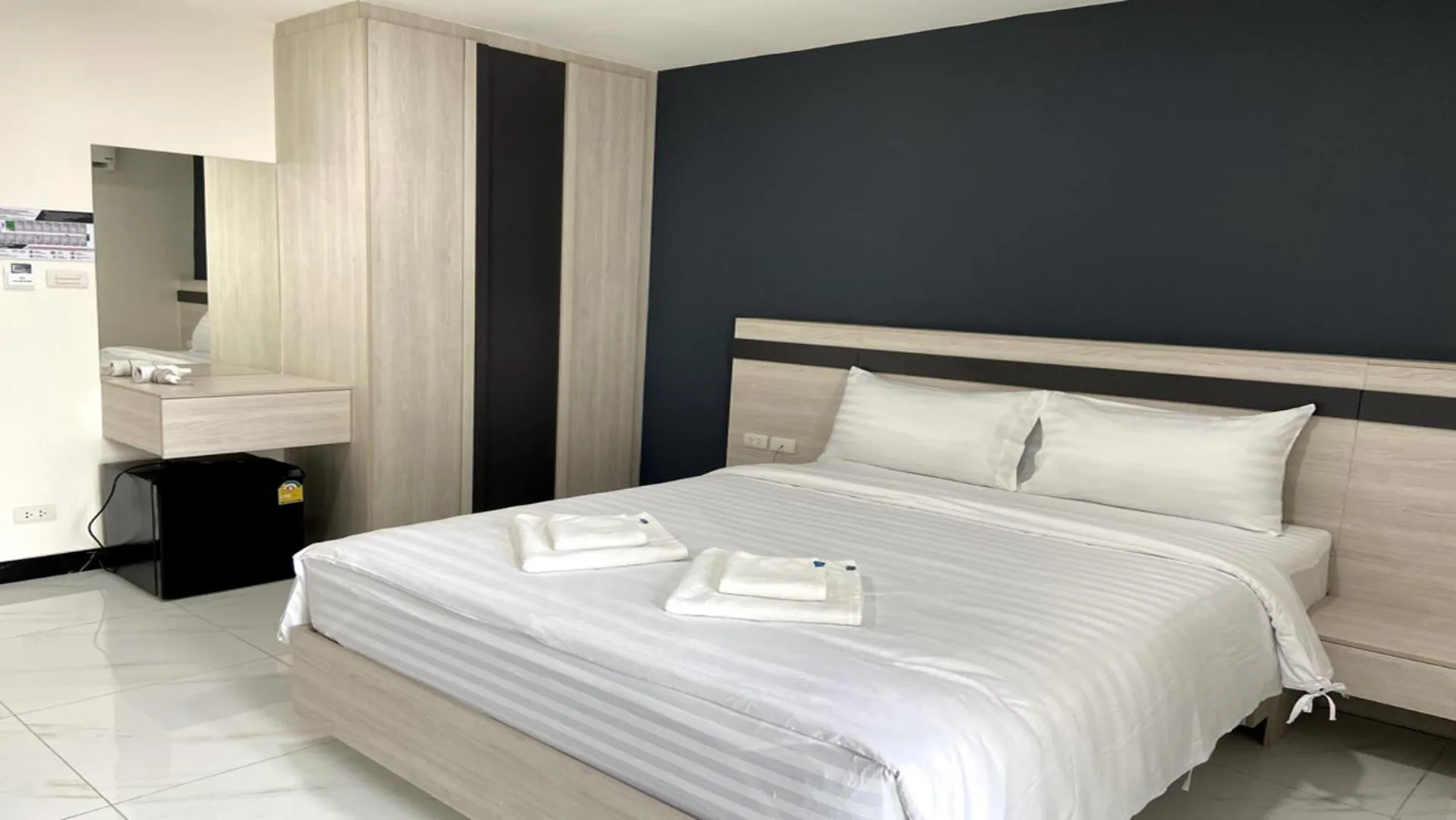 Bed in OK Hotel Bangkok