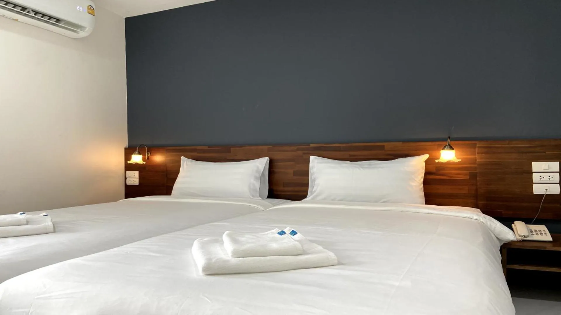 Bed in OK Hotel Bangkok