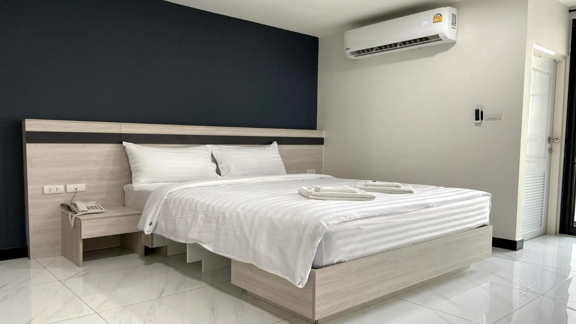 Bed in OK Hotel Bangkok