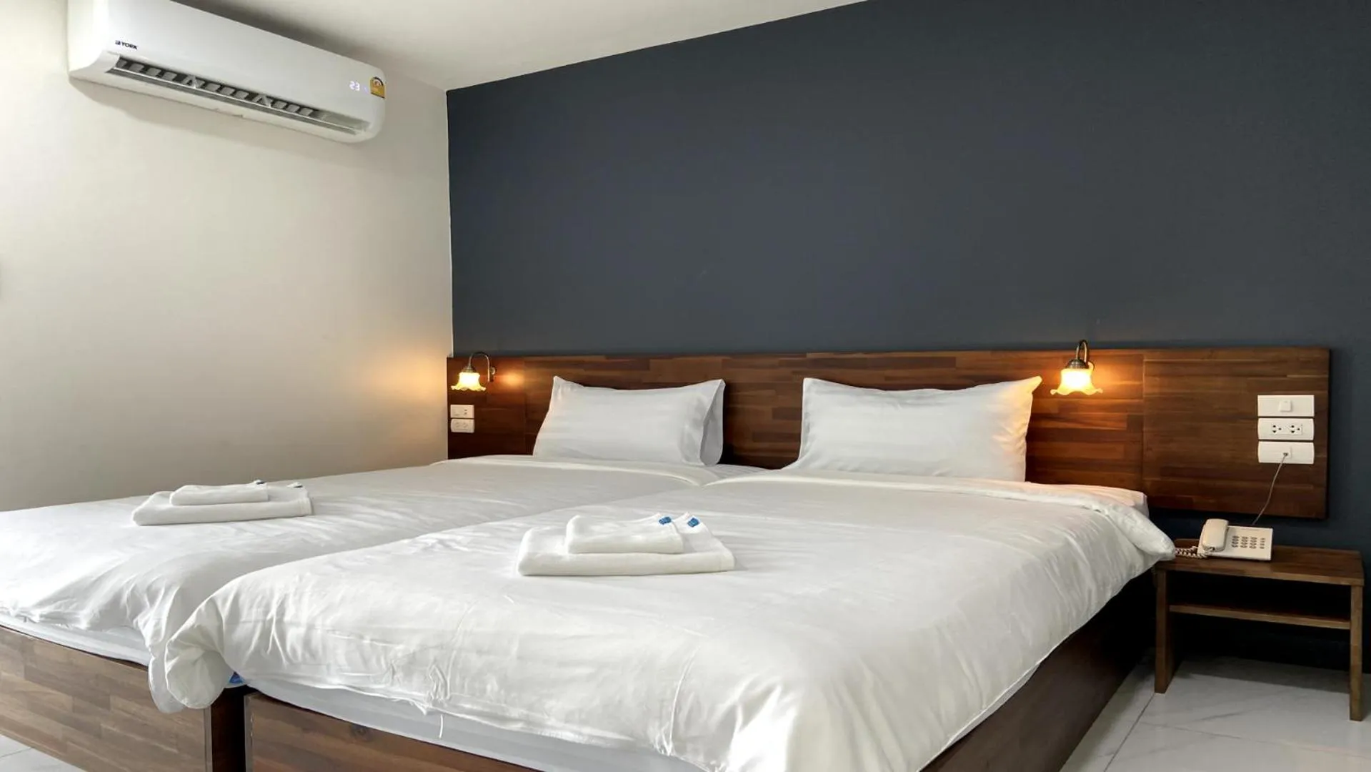 Bed in OK Hotel Bangkok