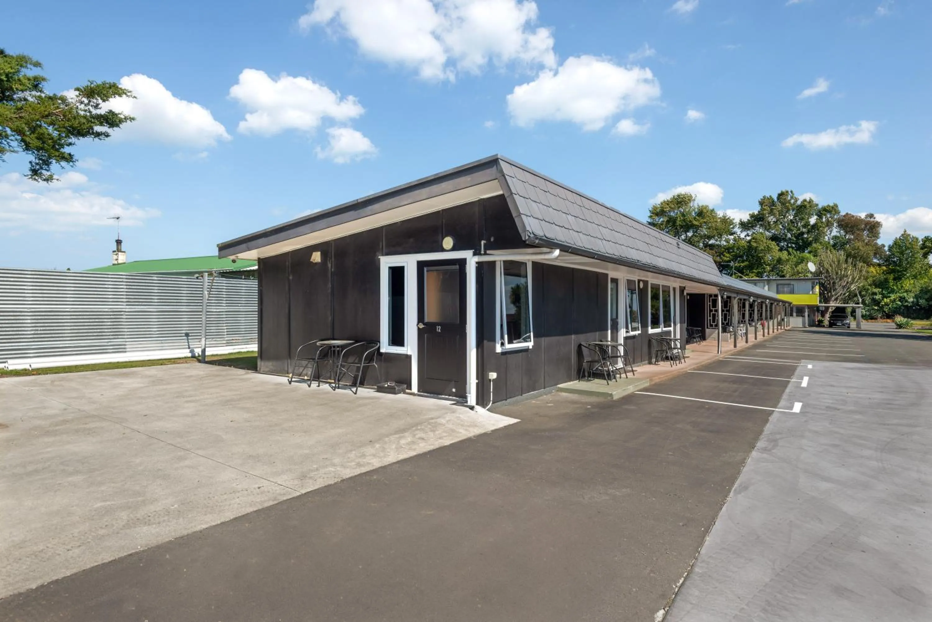 Property building in Travellers Inn Motel