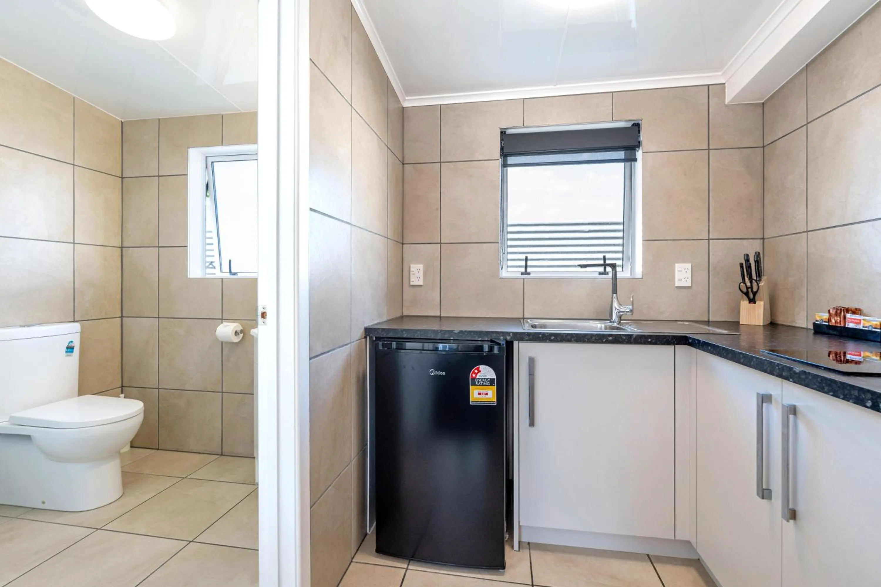 Toilet in Travellers Inn Motel