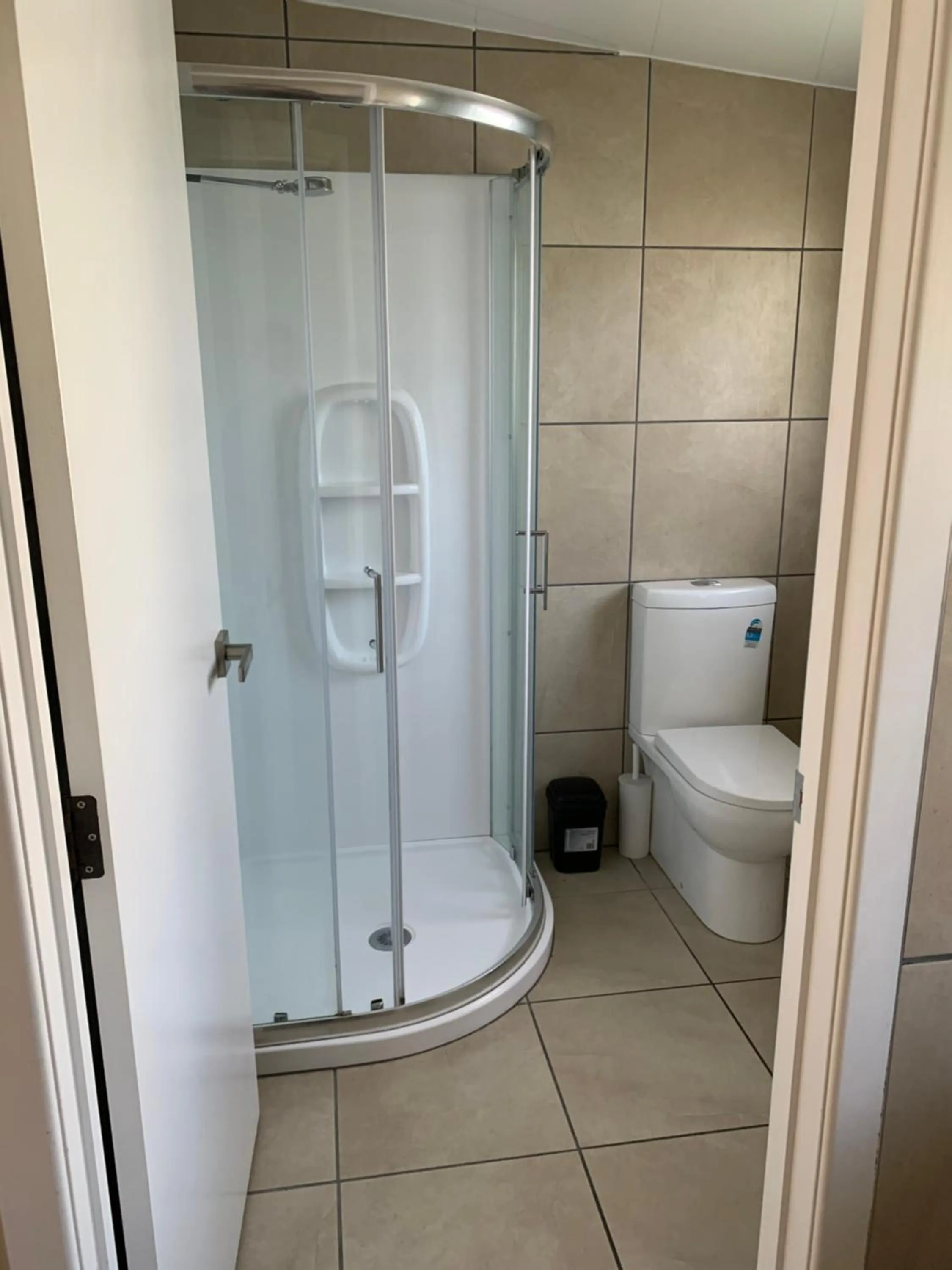 Bathroom in Travellers Inn Motel