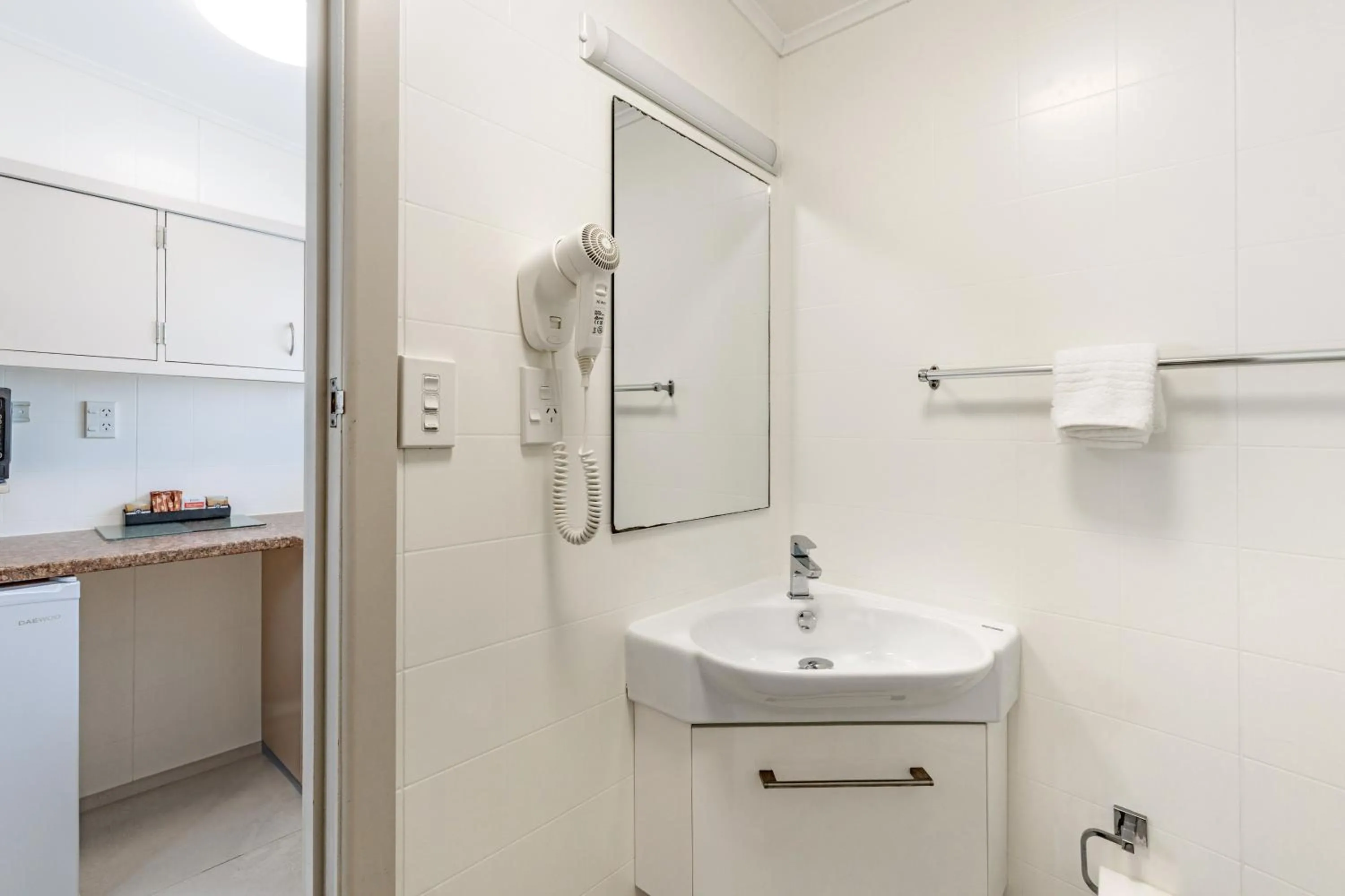 Bathroom in Travellers Inn Motel