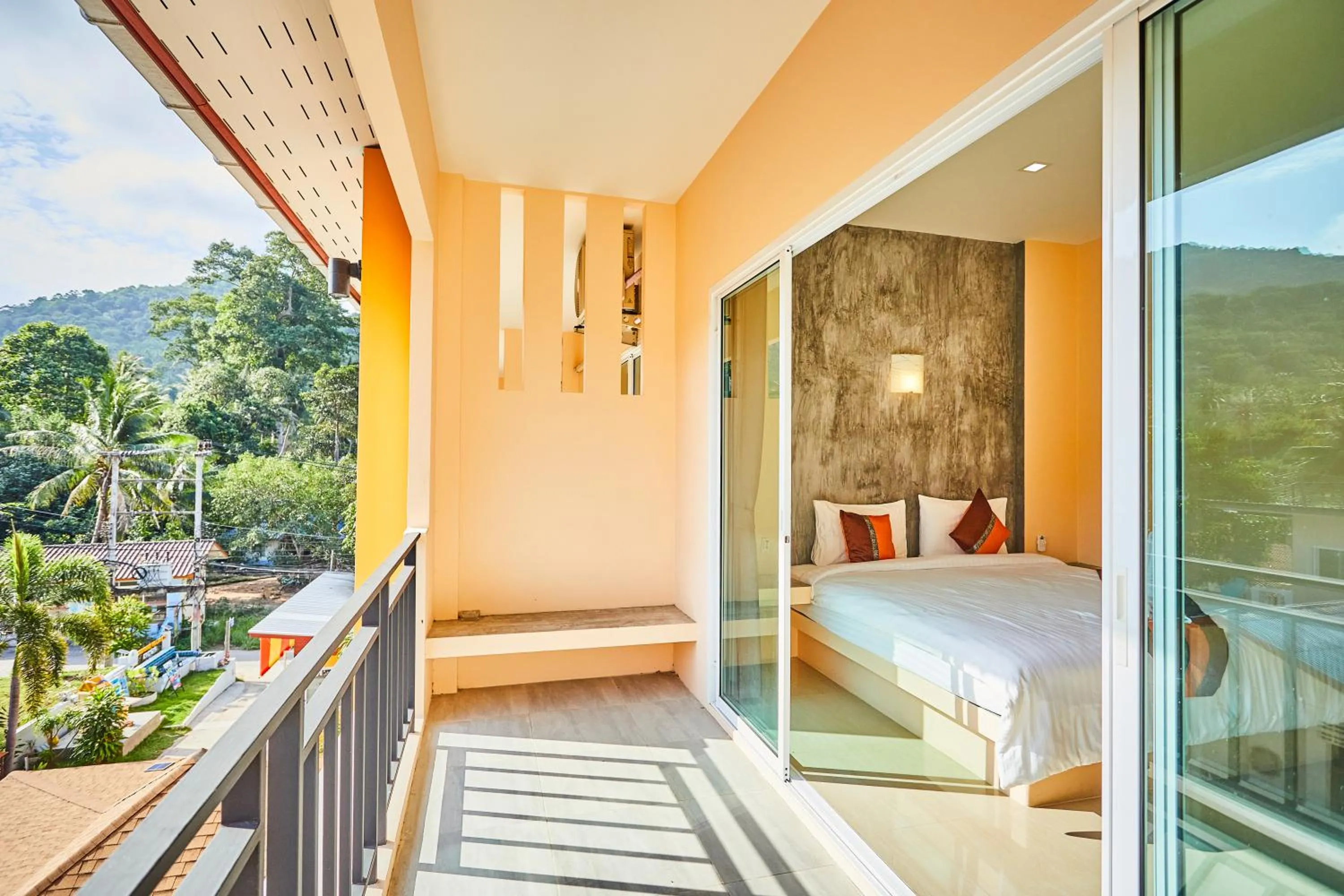 Bed in Coco Palm Hotel Koh tao